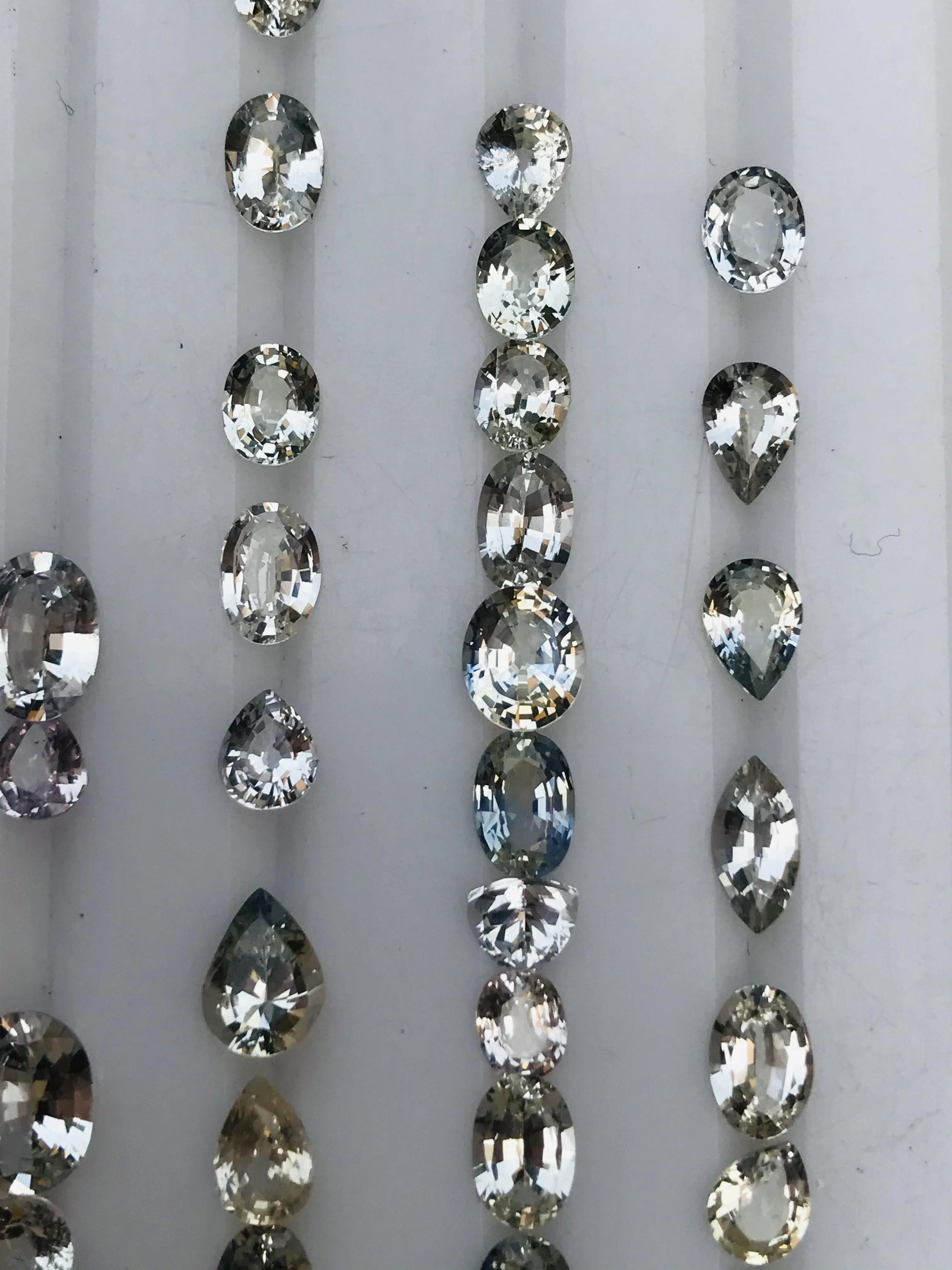 16.45 ct Oval, Round, Pear Colorless Sapphire-White Sapphires