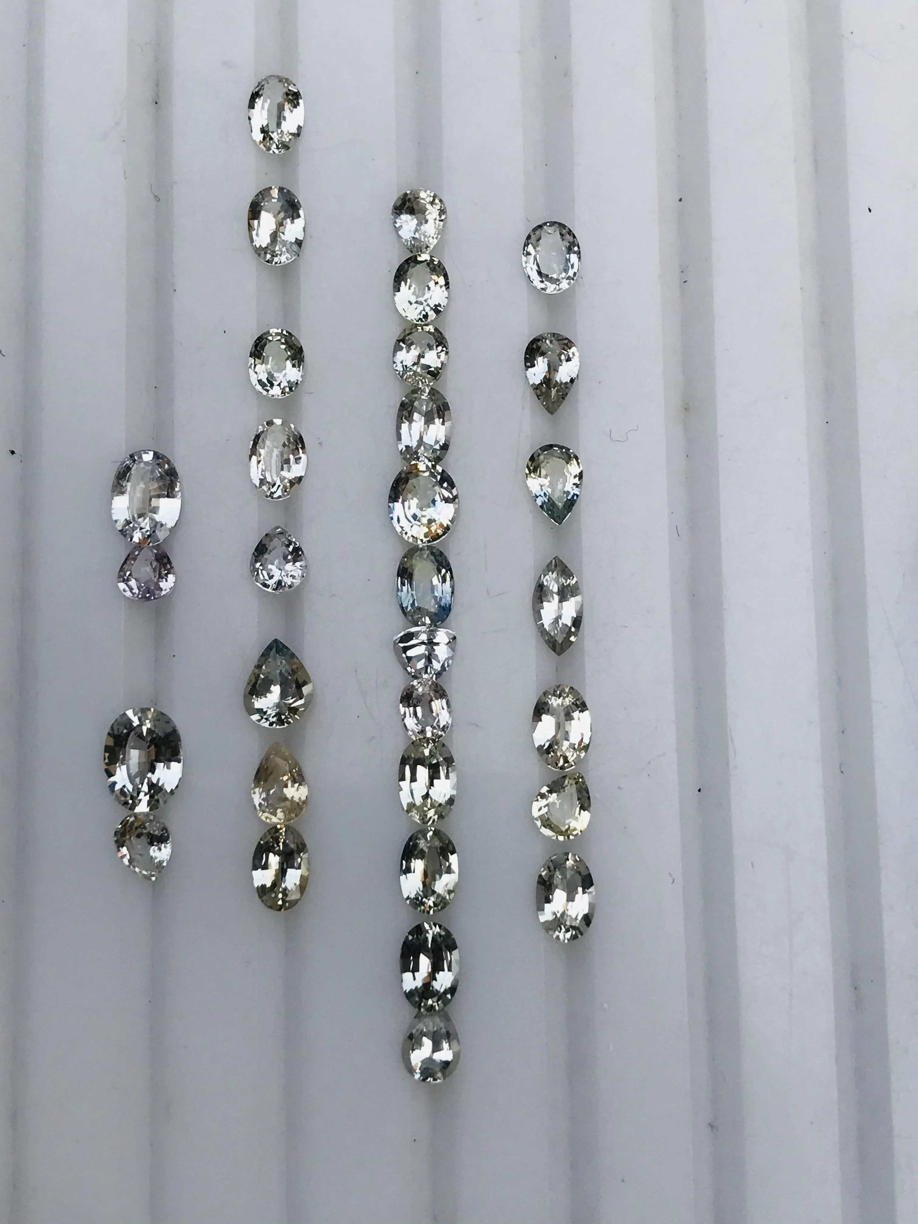 16.45 ct Oval, Round, Pear Colorless Sapphire-White Sapphires