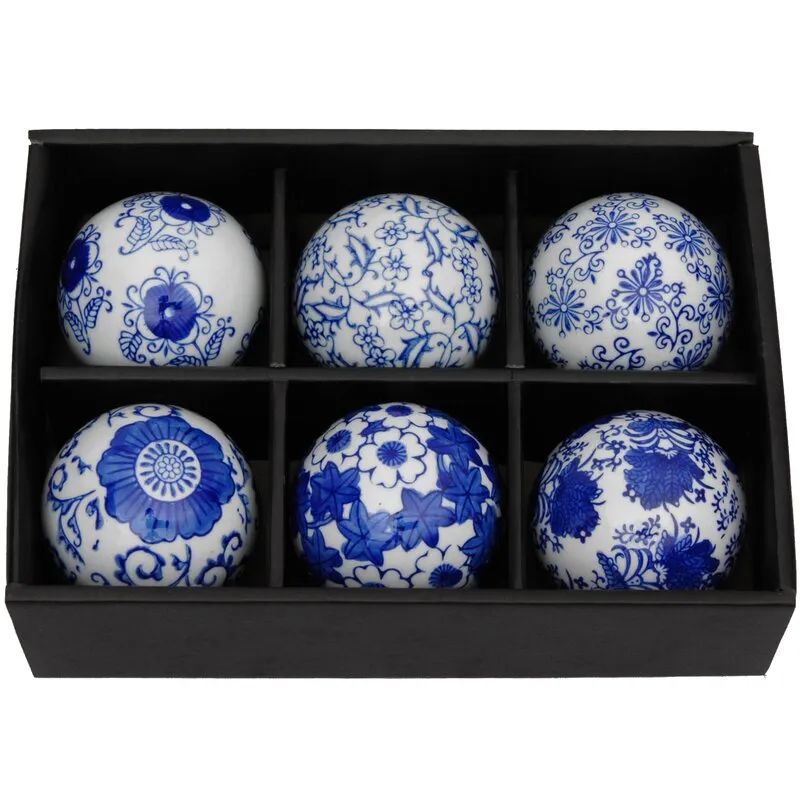 DeKalb Floral Design Decorative Porcelain Balls (Set of 6), bunch them together in a ceramic bowl for an artful accent.  Retails $107 