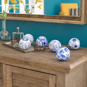 DeKalb Floral Design Decorative Porcelain Balls (Set of 6), bunch them together in a ceramic bowl for an artful accent.  Retails $107 