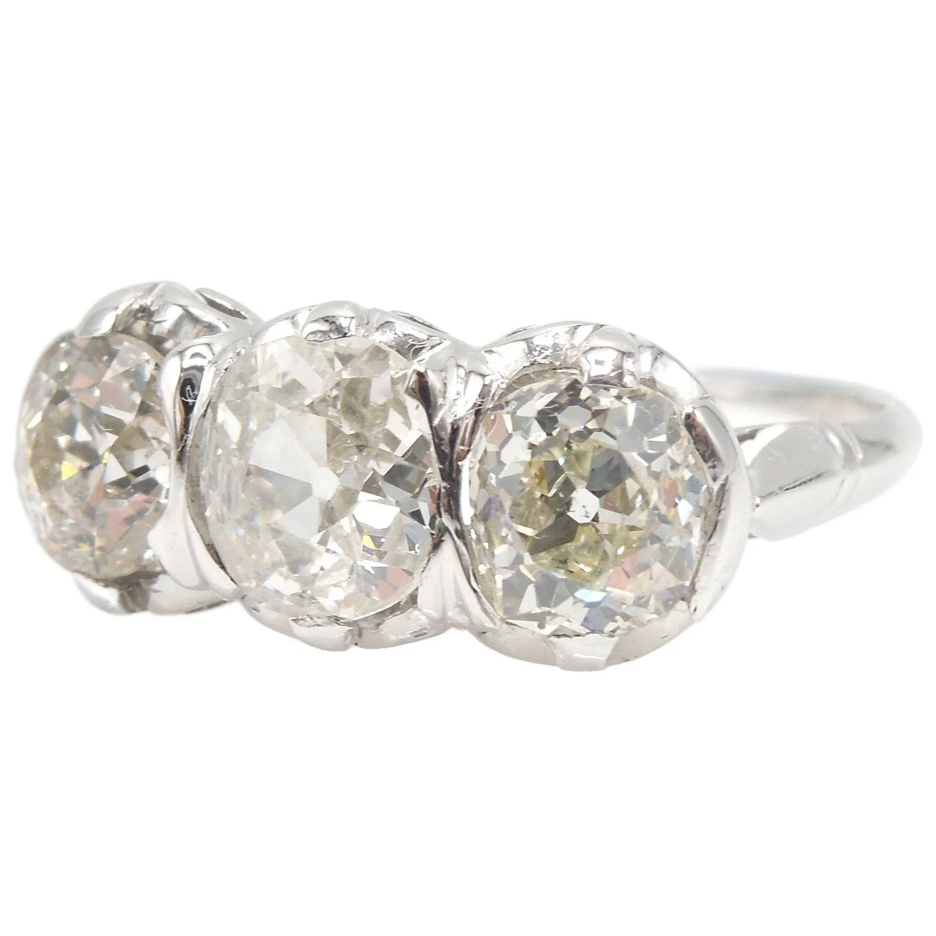 Filigree Edwardian 2.41ct Three Stone Old Mine Cut Diamond Ring in Platinum
