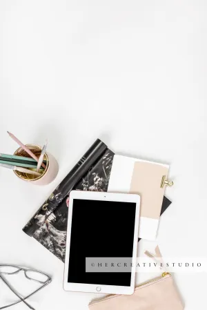 Tablet, Pencils & Magazines on White Backgorund